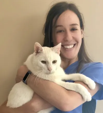Jessa B holding a cat at Middlesex County Animal Hospital
